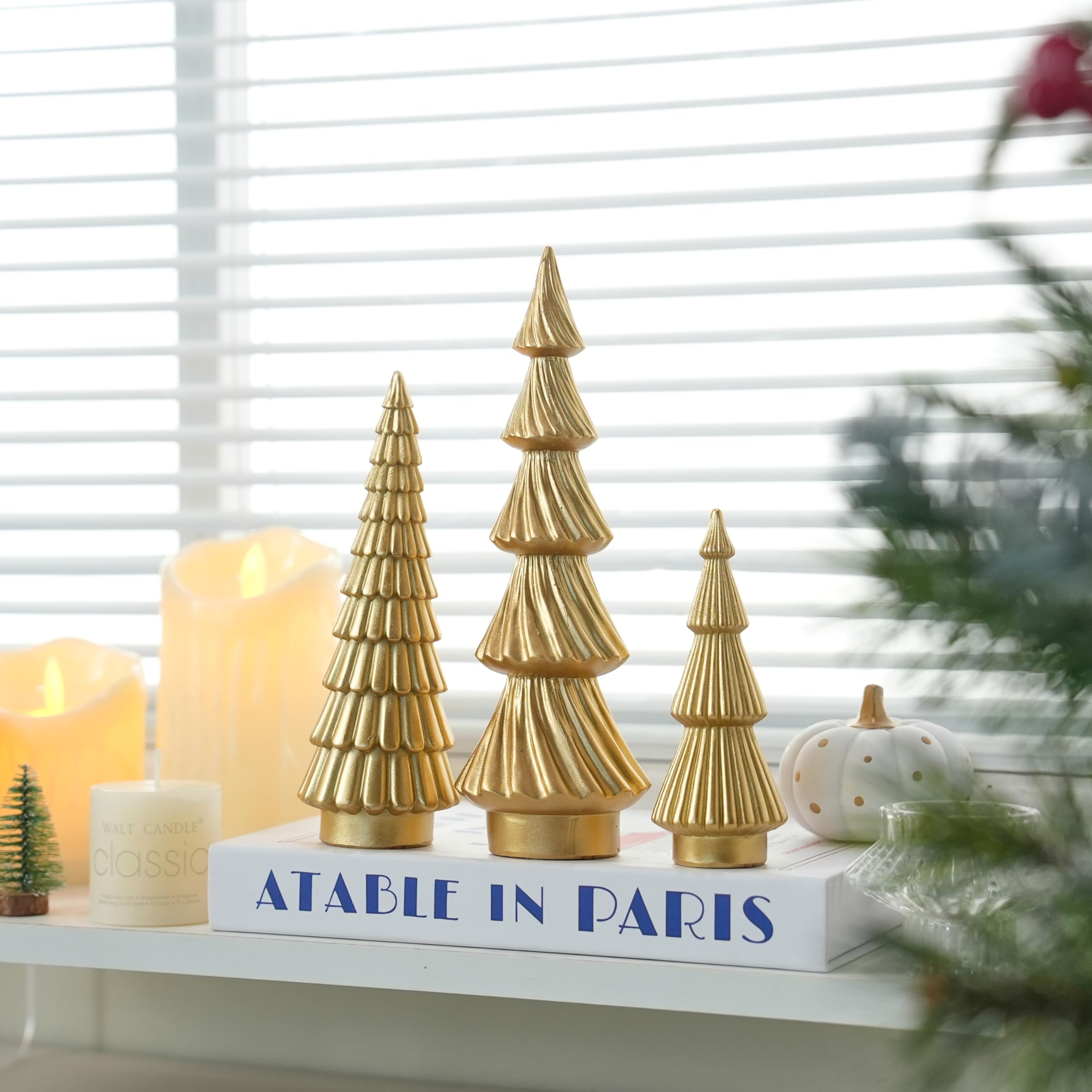 FESTGLOX tree next to candle showing scale and tabletop styling benefit