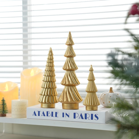 FESTGLOX tree next to candle showing scale and tabletop styling benefit