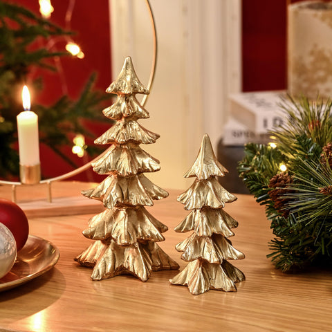 FESTGLOX trees paired with candles creates cozy holiday atmosphere
