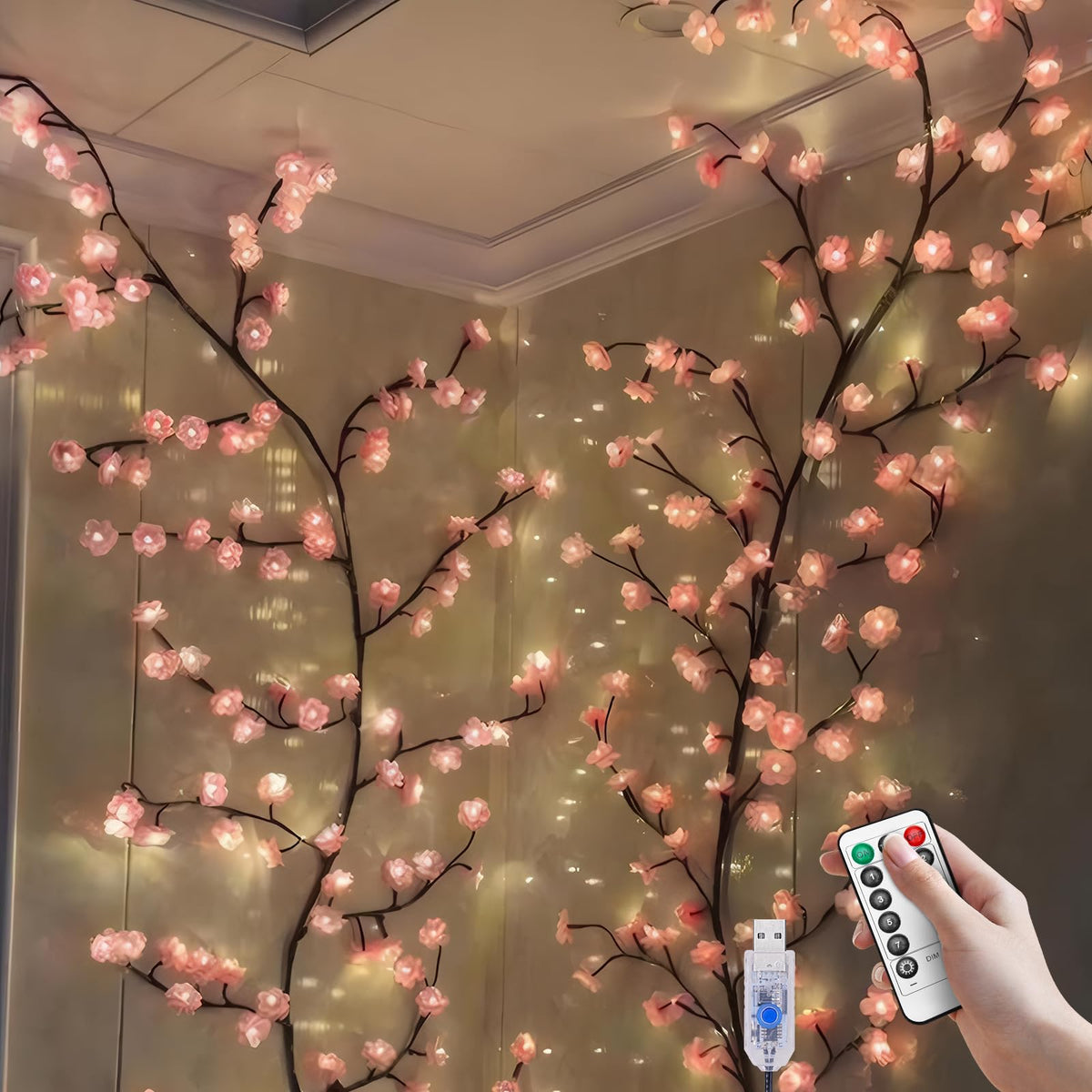 FIALAME front view of pink cherry blossom garland showing soft LEDs and branches for cozy ambience