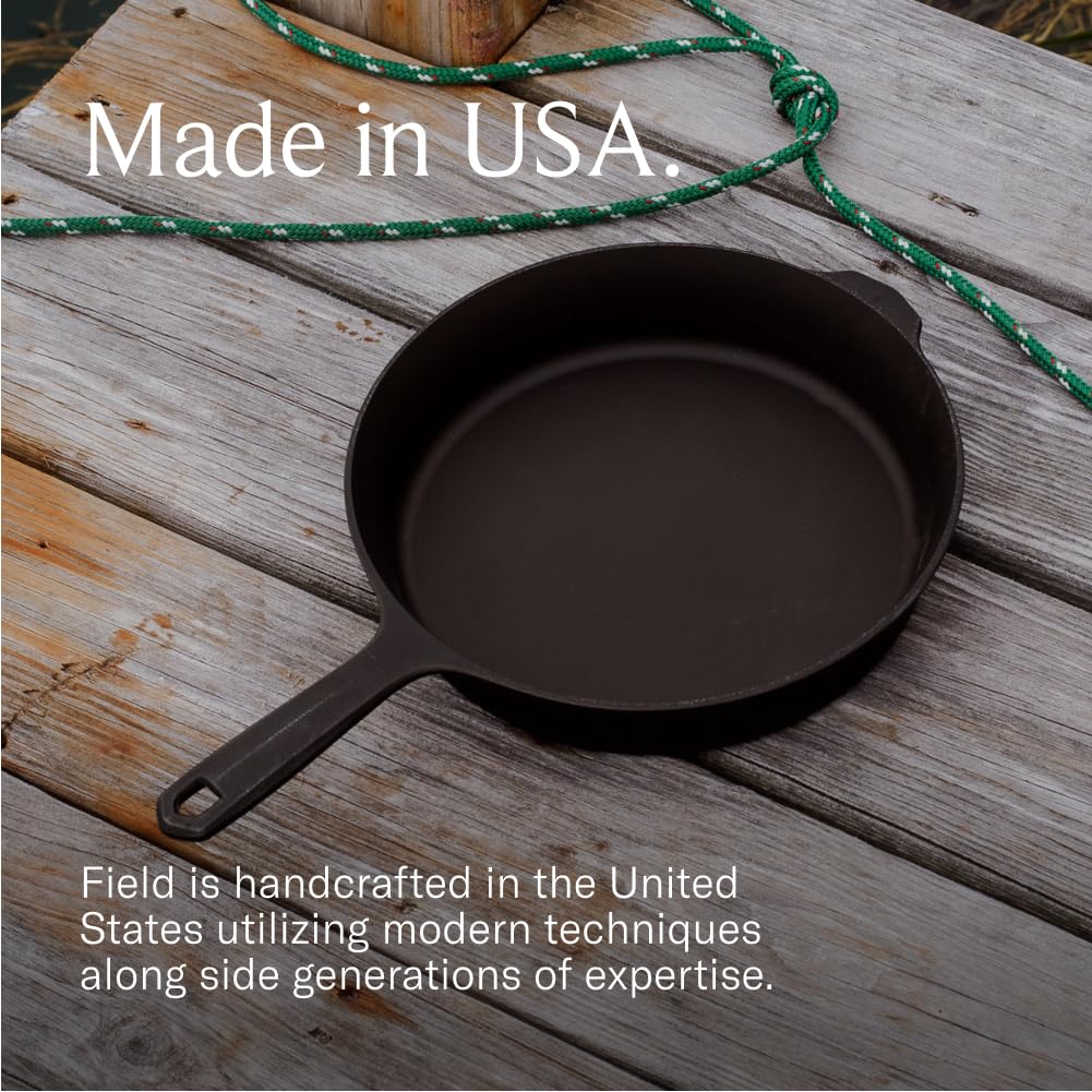 Field Company skillet on grill searing steak to show high-heat searing performance