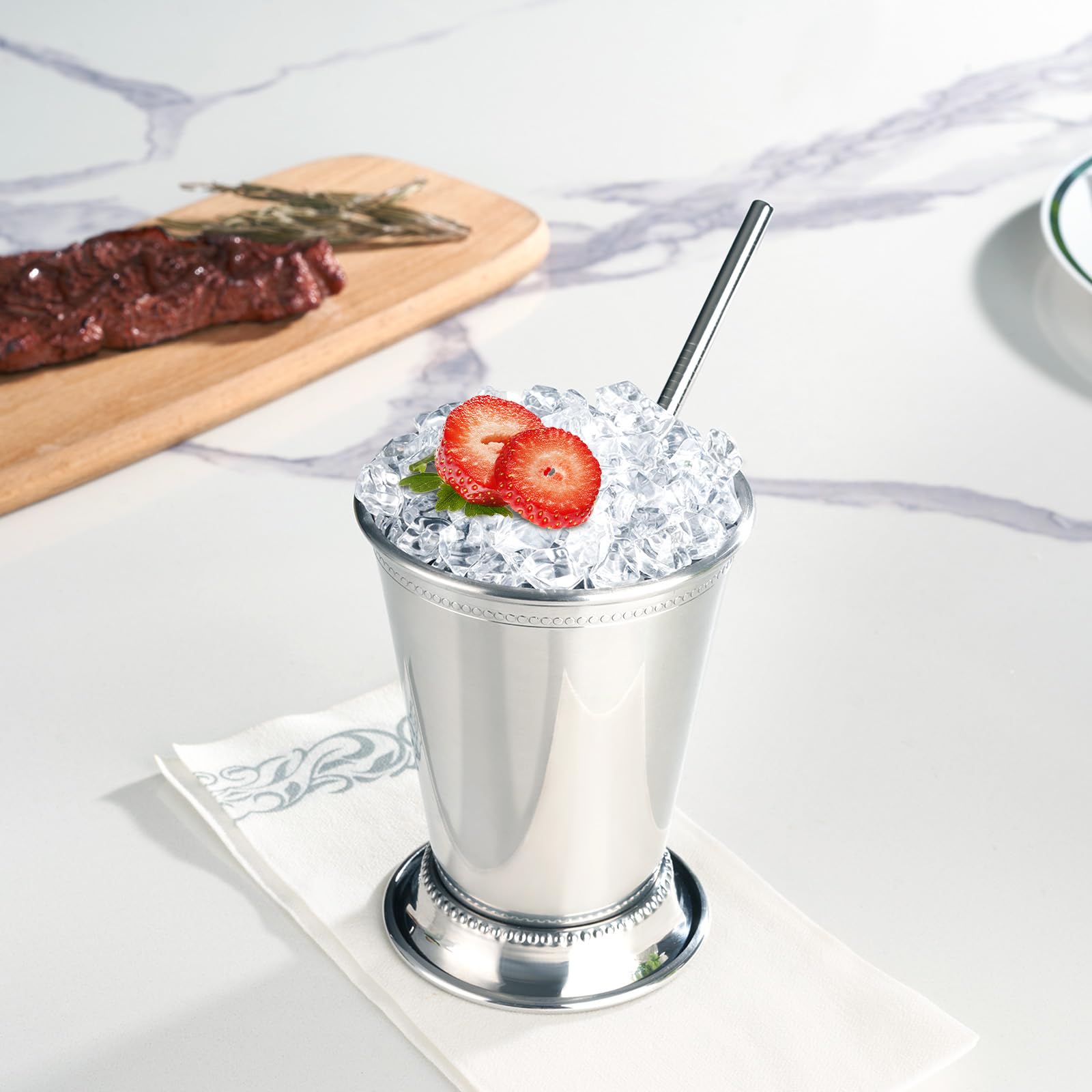 Fijinhom cup with straw and crushed ice demonstrating cold retention benefit