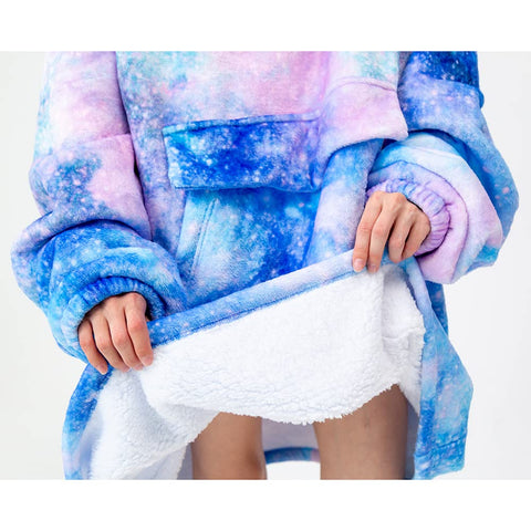 Fiosnow Galaxy blanket hoodie draped on sofa to show true-to-life size and scale