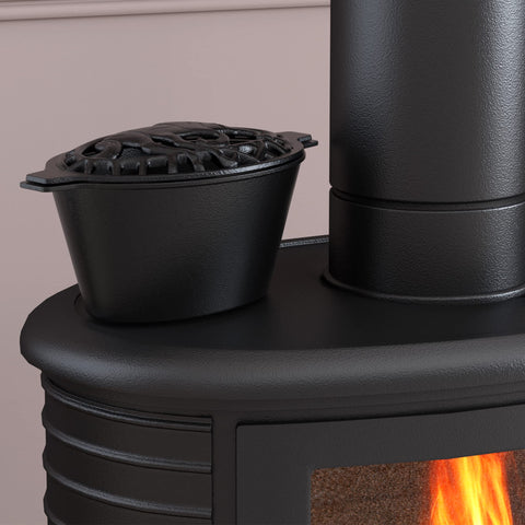 Fire Beauty close-up of carved lattice lid highlighting faster evaporation and aroma diffusion