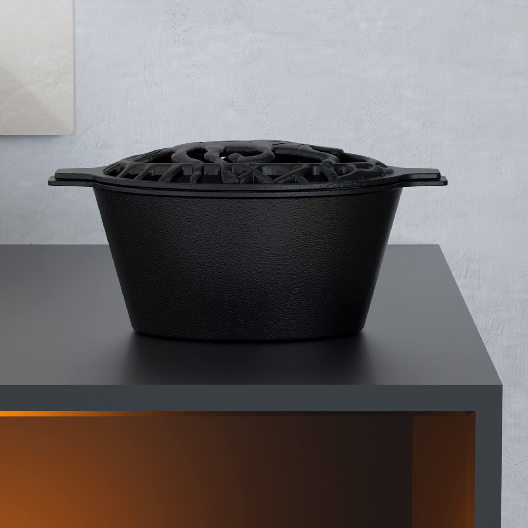 Fire Beauty flat oval base sitting on stove demonstrating stable contact and even heating
