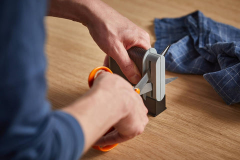 Fiskars Clip-Sharp packaging and label showing product identification benefit