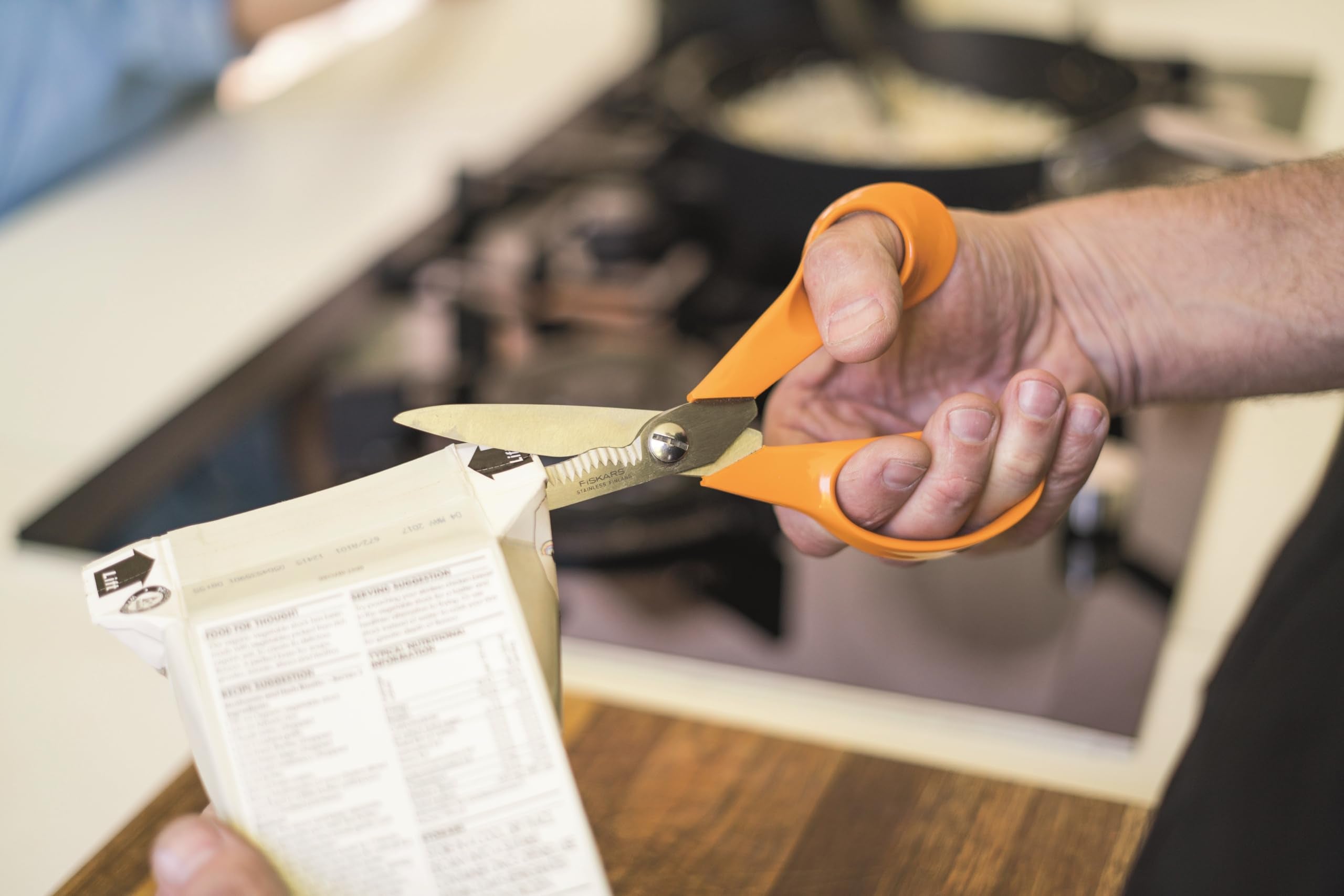 Fiskars scissors cutting fresh herbs, neat results for food preparation