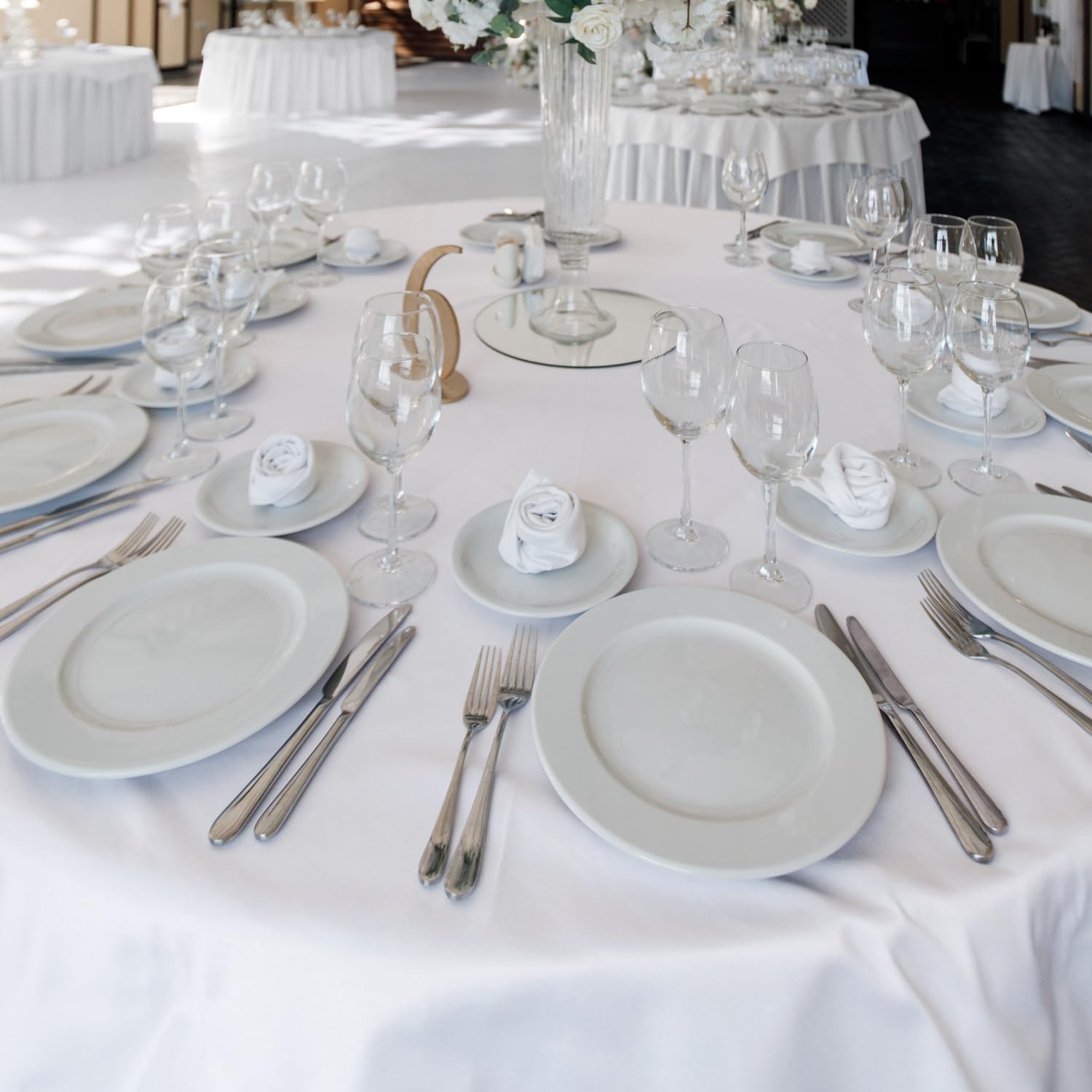 Fitable side profile showing 70-inch drape over a 48-inch table