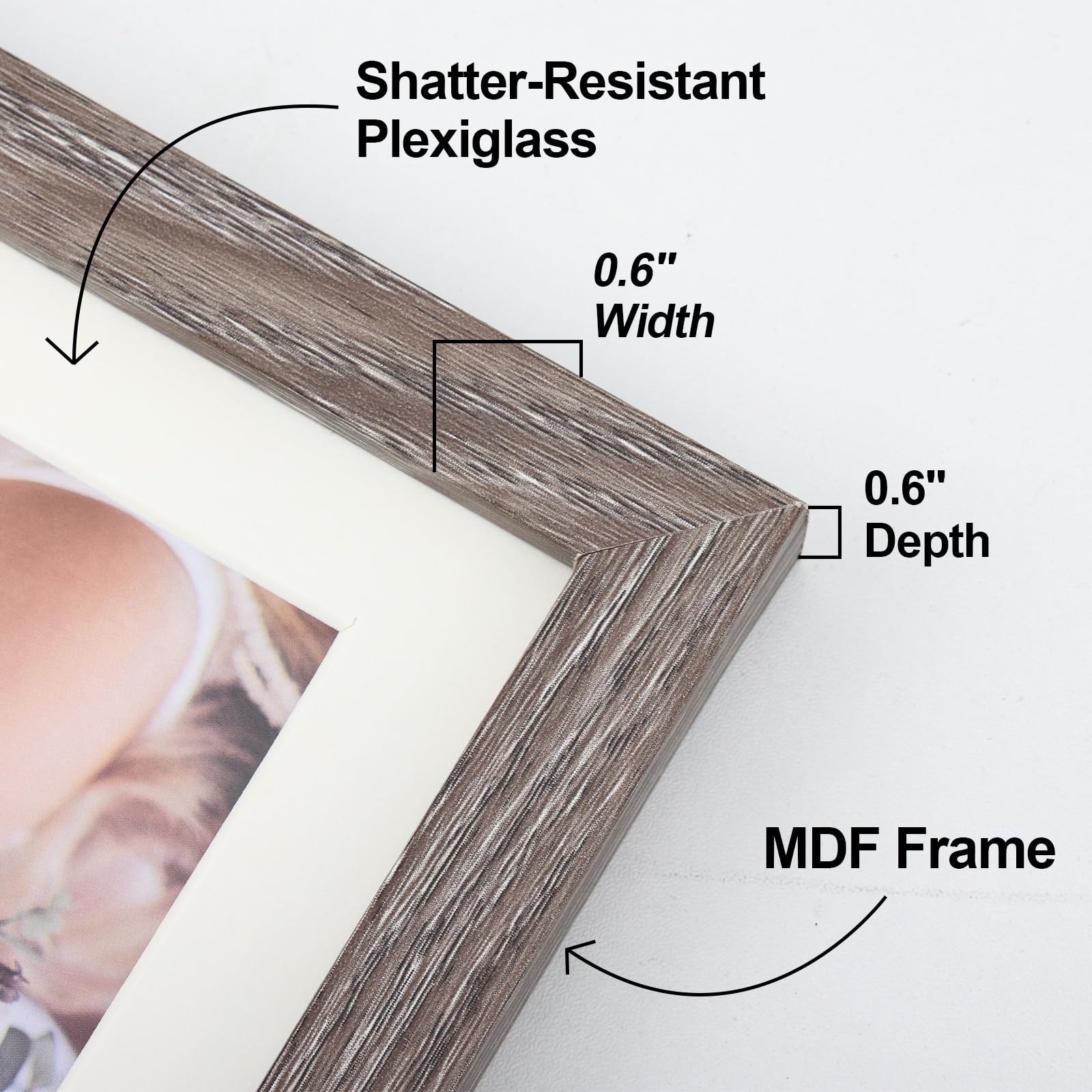 Fixwal frames arranged on a living room wall creating a cohesive photo gallery