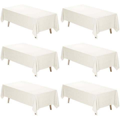 Fixwal front view on rectangular table showing clean ivory finish and elegant setting