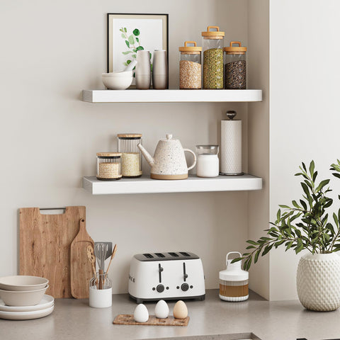 Fixwal shelf in kitchen holding spices and small jars to maximize counter space benefit