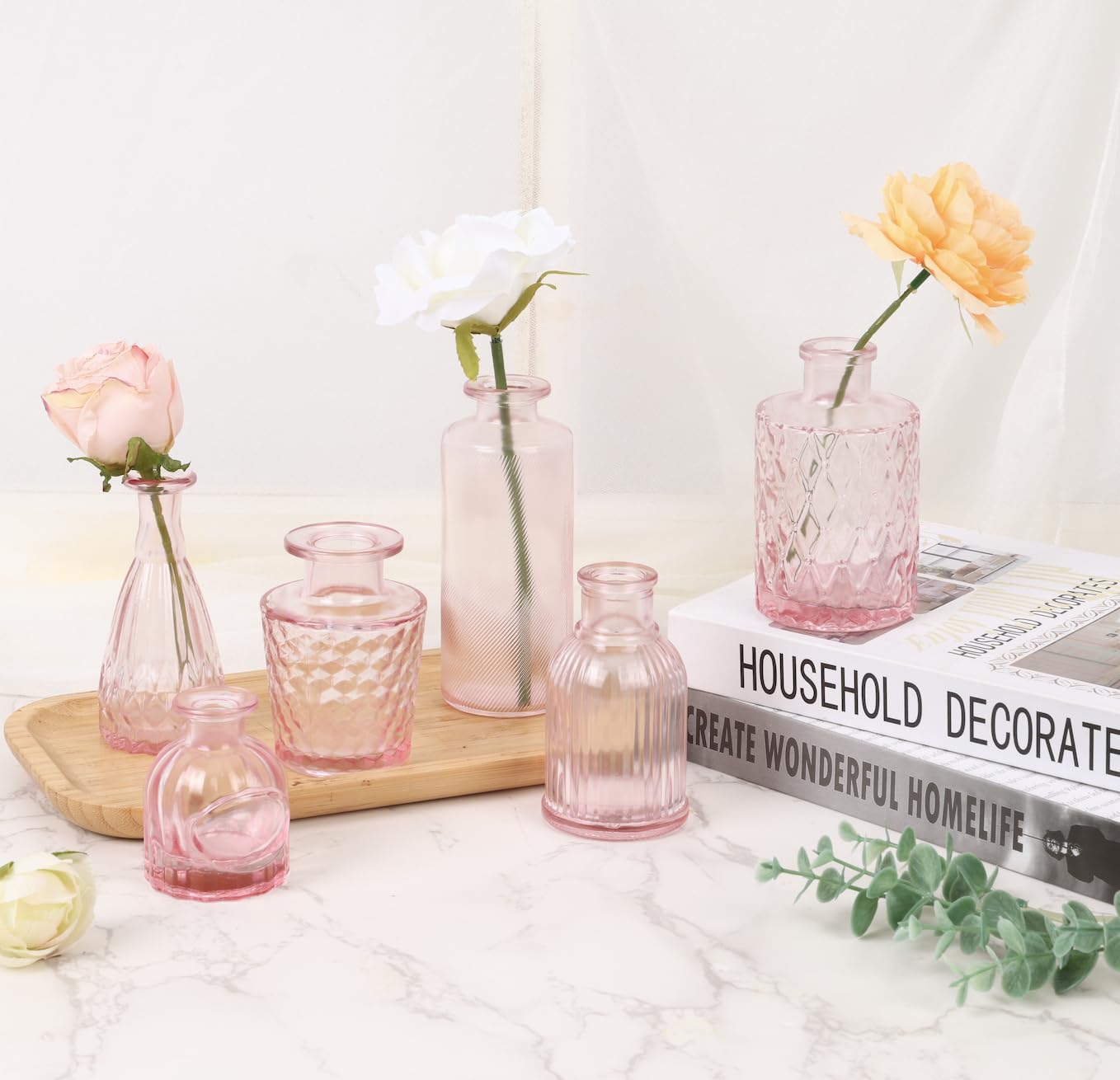 Fixwal pink vase with single stem in use shows elegant minimal centerpiece
