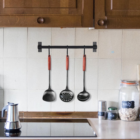 FJNATINH spatula flipping vegetables in wok demonstrating heat-safe reach