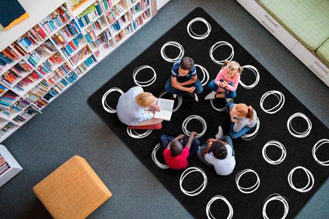 Flagship Carpets label and edge close-up showing Made in USA craftsmanship and safety certification