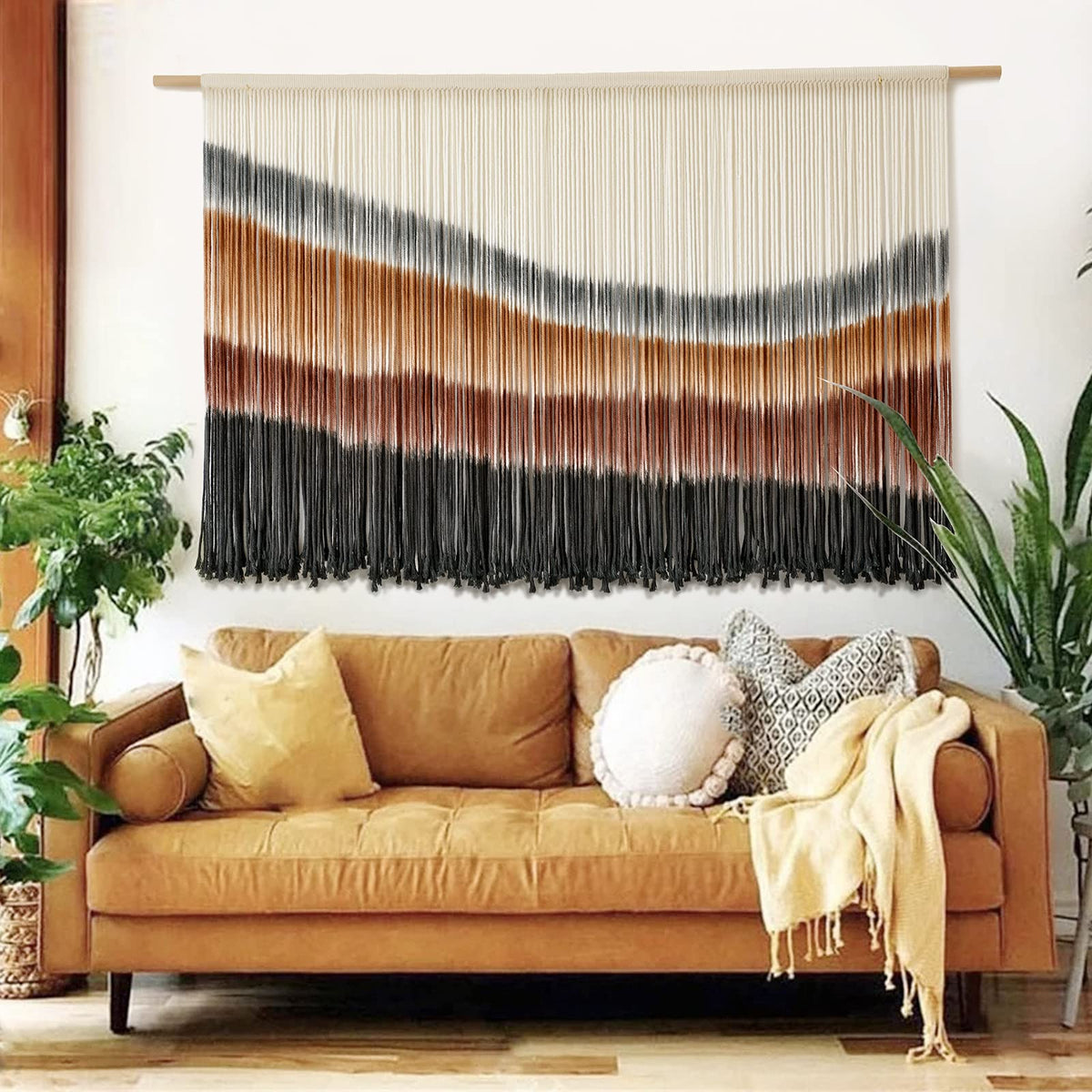 Flber front view of large macrame tapestry showing colors and shape, enhances room warmth