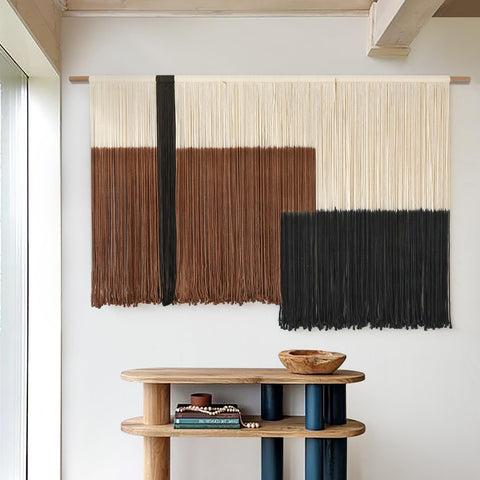 Flber macrame installed above bed illustrating how it frames a headboard and softens space