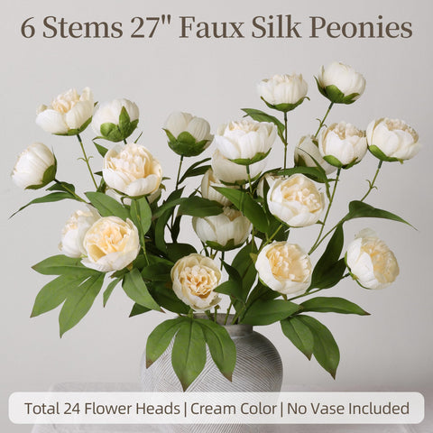 florisso grouped peonies in tall glass vase creating elegant focal point
