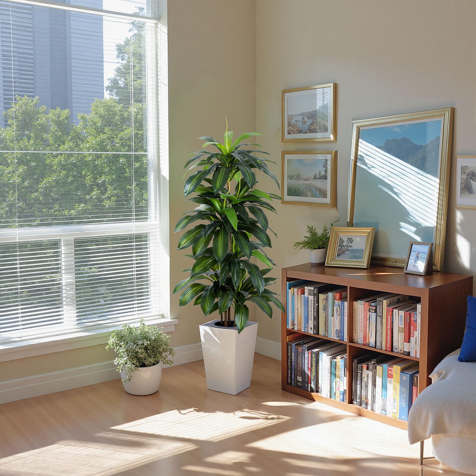 FLOWORLD plant next to sofa showing 5ft scale and room-proportion benefit