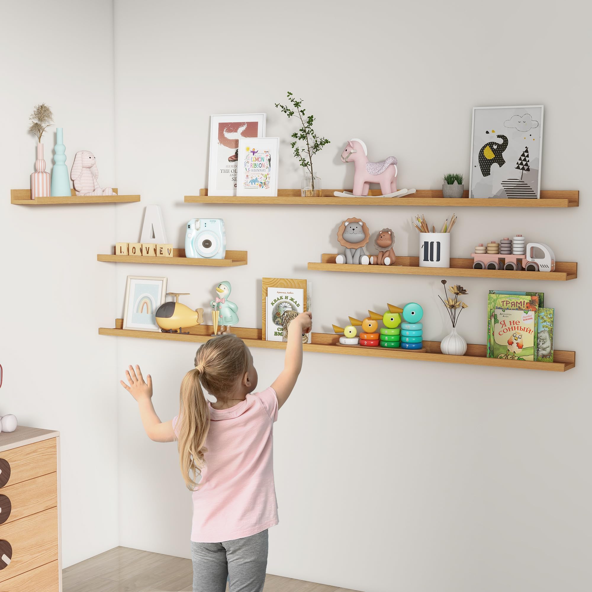 FLYJOE pair of shelves styled above sofa creating layered gallery impact