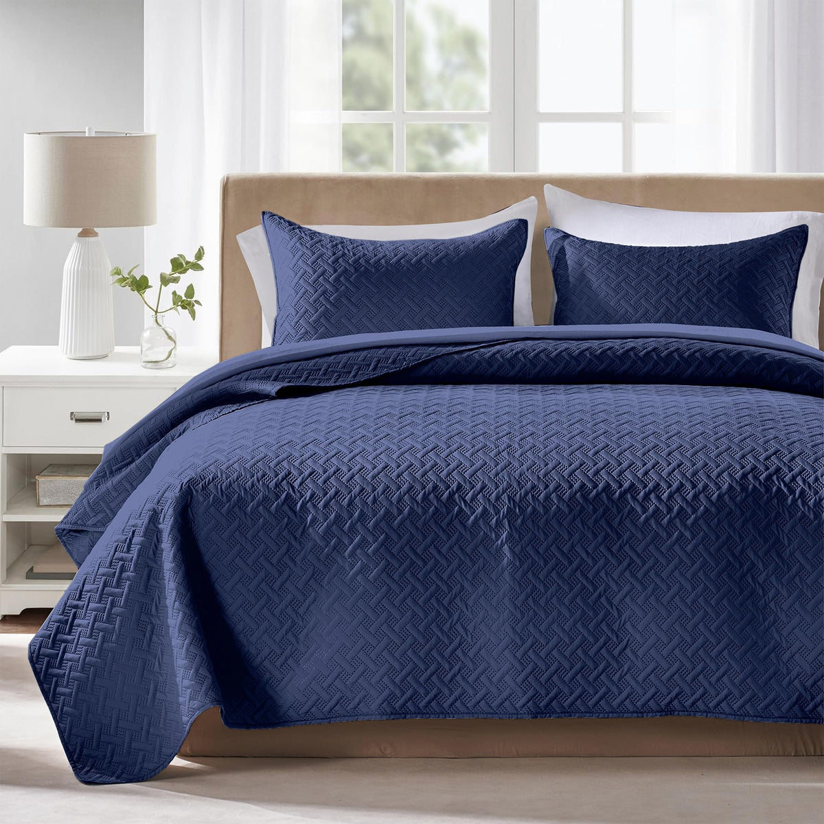 FLYMME king quilt front view showing navy coverlet and neat drape, enhances bedroom look