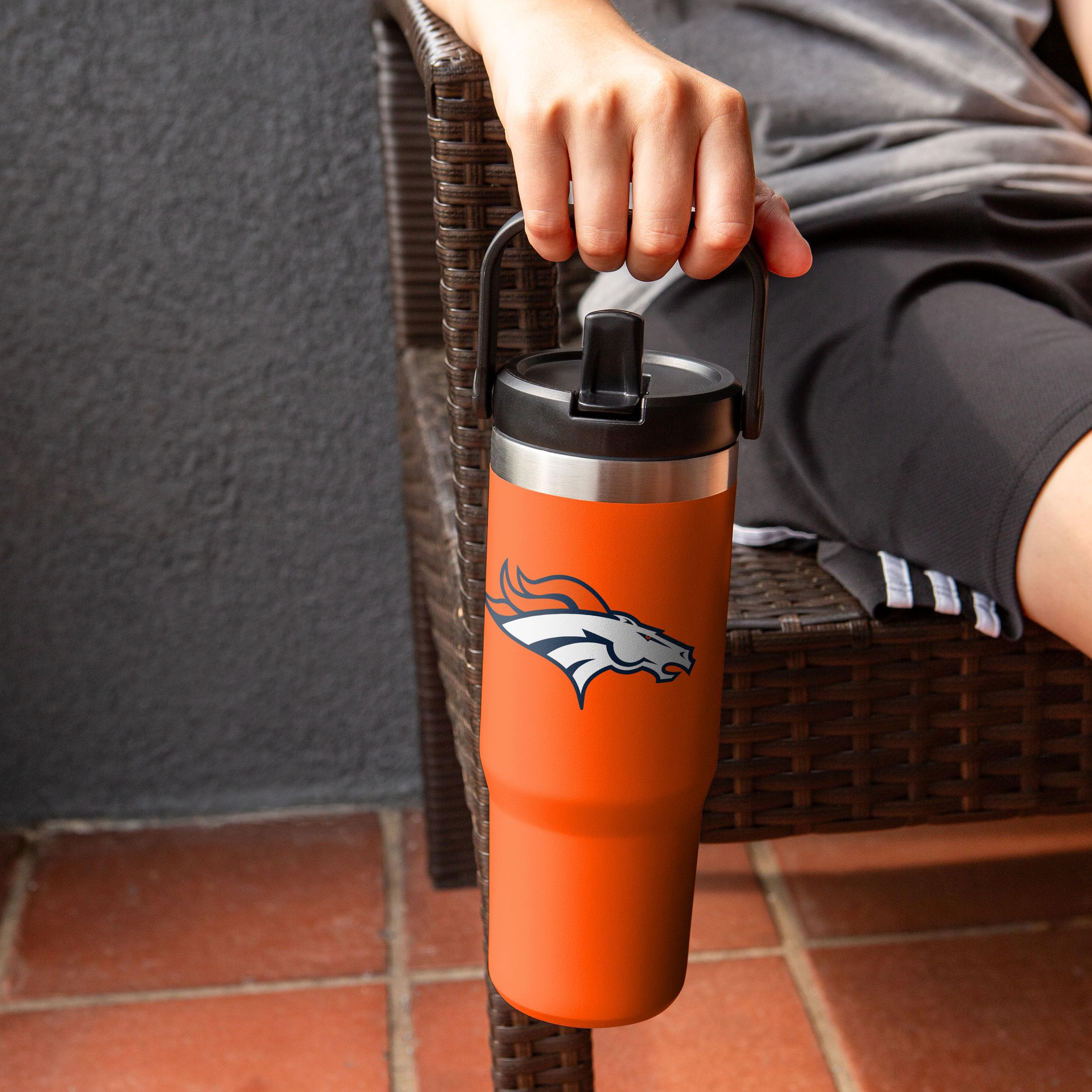 FOCO Denver Broncos tumbler on tailgate setting showing fan-ready convenience