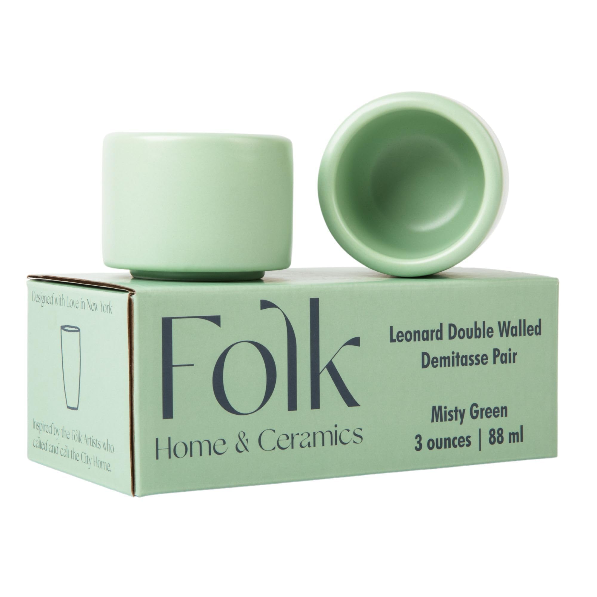 Folk Ceramics front view showing two misty green espresso cups, elegant display benefit