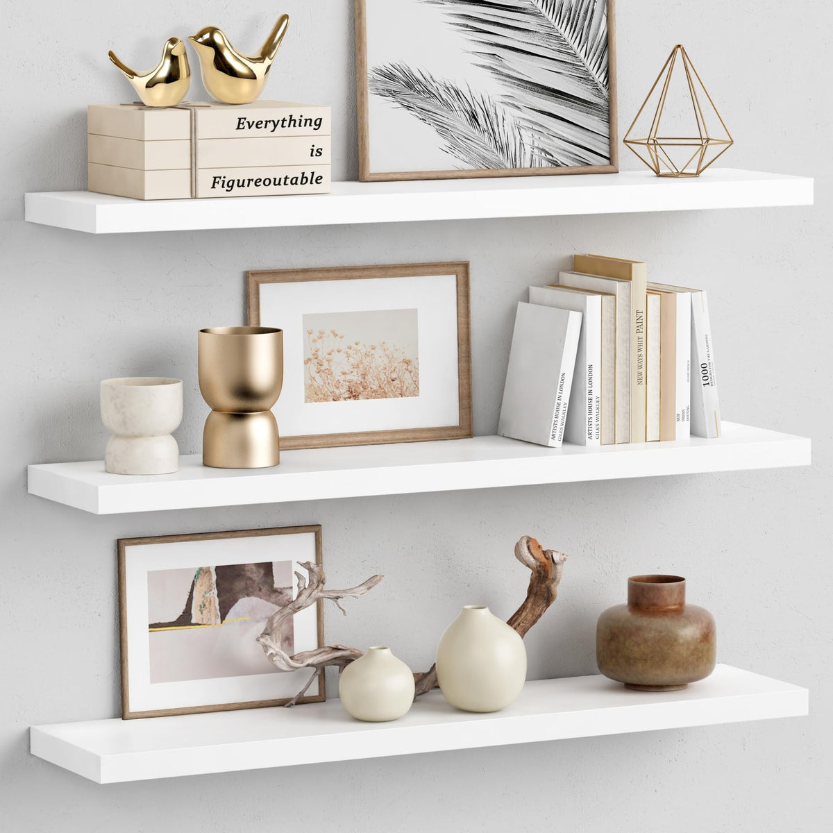 Forbena front view of three white floating shelves showing clean silhouette and tidy storage