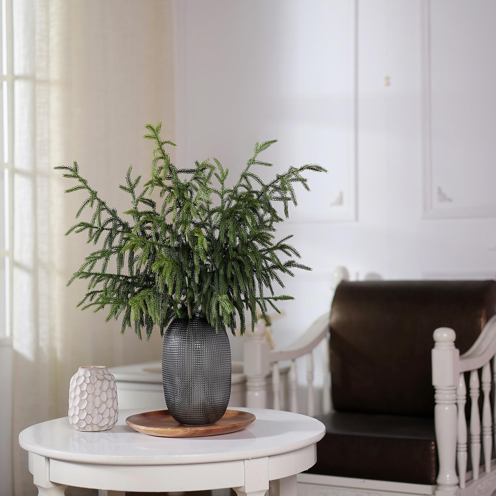 FOTEEWL Norfolk pine on a Christmas mantel adding seasonal fullness and low-maintenance charm
