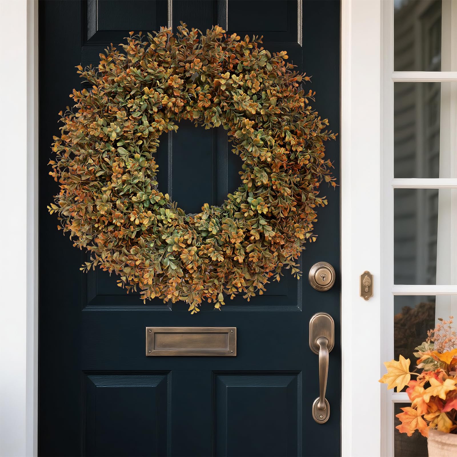 FOTEEWL wreath next to door illustrating true 24–26 inch scale benefit