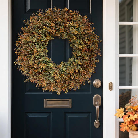 FOTEEWL wreath next to door illustrating true 24–26 inch scale benefit