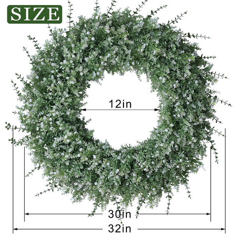 FOTEEWL wreath beside a standard door for size and scale reference