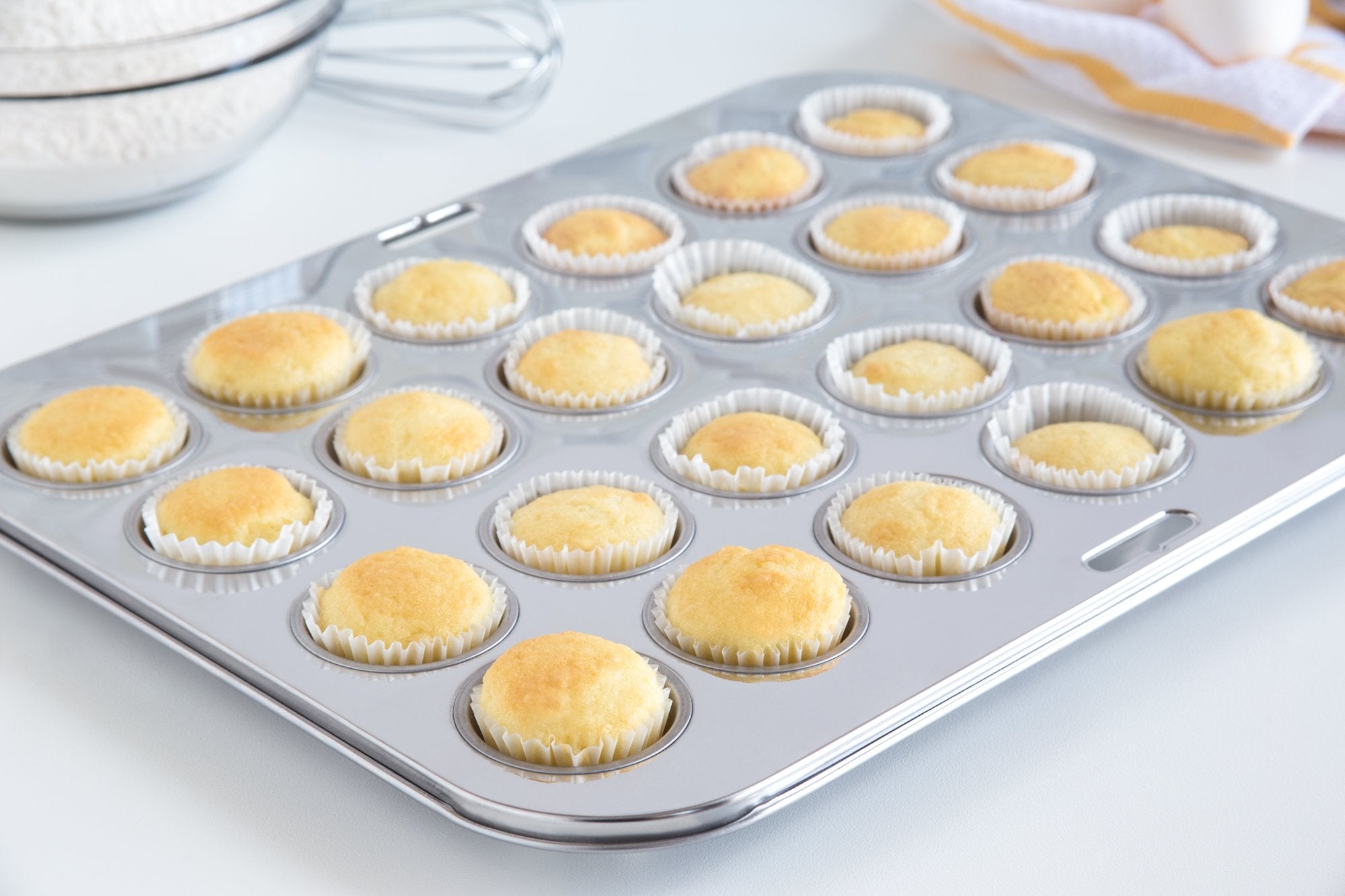 Fox Run close-up of mini cups highlights smooth stainless interior for easy release and cleanup