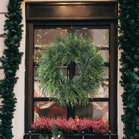 FPROOM wreath decorated with ribbon and lights showing easy customization benefit
