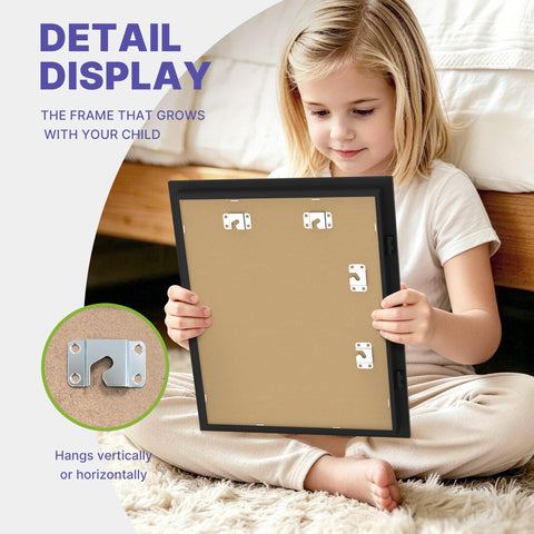 FrameWorks interior detail with elastic strap securing children’s artwork in place