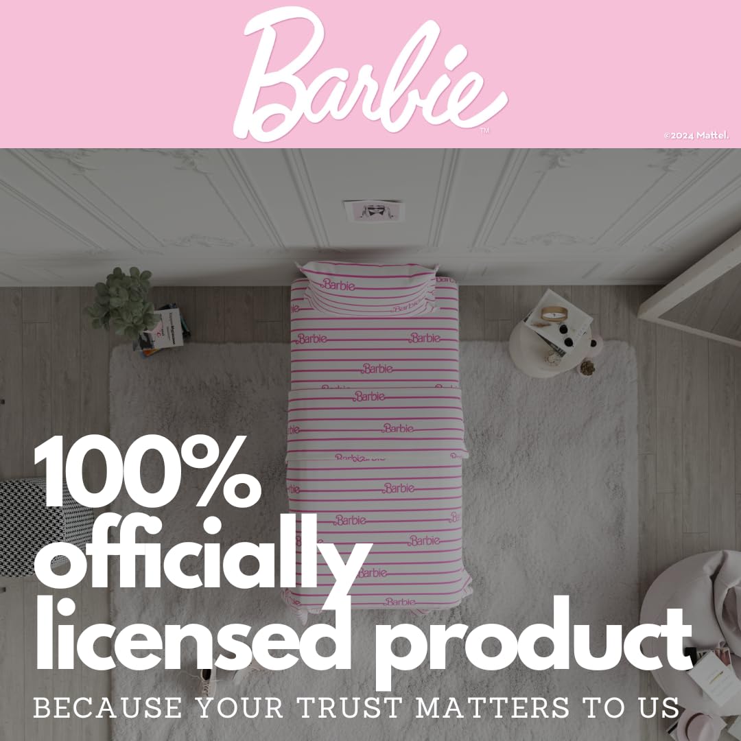 Franco Barbie styled bedroom with set on a made bed, adding playful fashionable ambiance