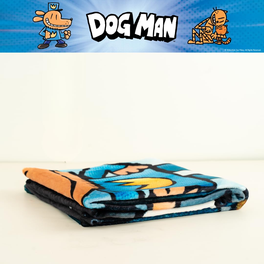 Franco Dog Man throw beside child showing the 46x60 size benefit