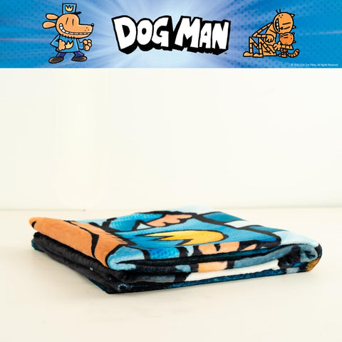 Franco Dog Man throw beside child showing the 46x60 size benefit
