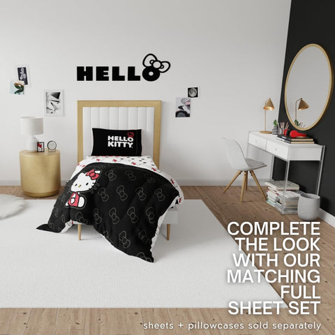 Franco Hello Kitty comforter next to ruler showing twin-size fit and scale