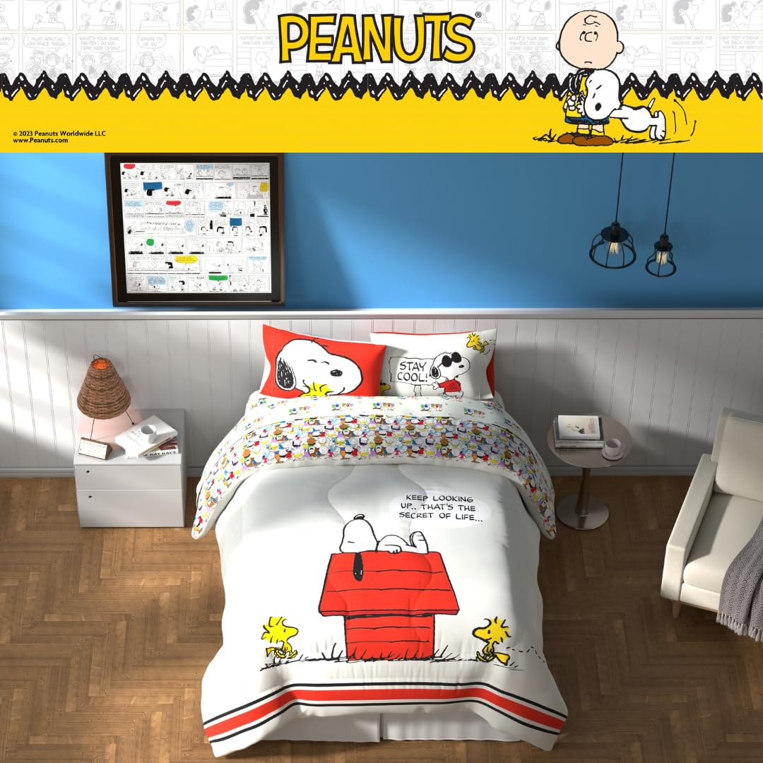 Franco Peanuts comforter beside ruler to show queen size fit and scale
