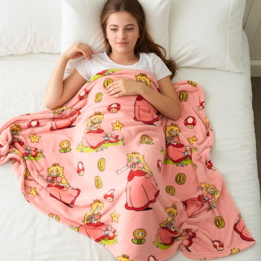 Franco Princess Peach throw draped on sofa, adding fandom flair and comfy seating