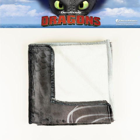 Franco Toothless throw styled on a kid’s bed adding character and room color