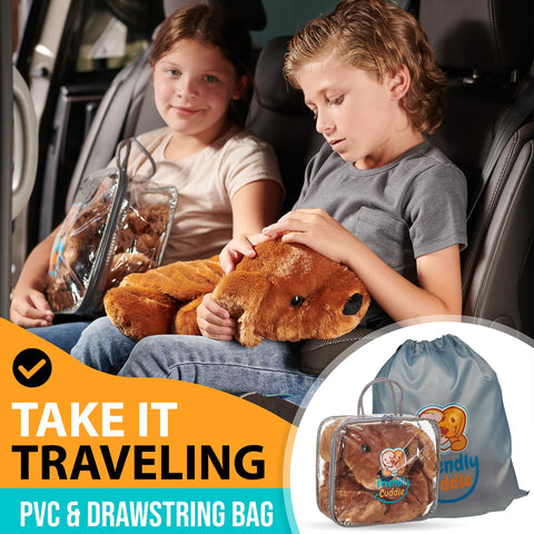 FRIENDLY CUDDLE removable microwavable insert being warmed for gentle heat comfort