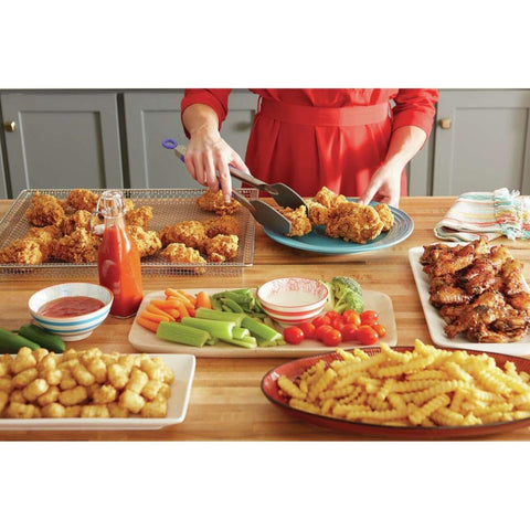 Frigidaire airfrytray loaded with wings illustrating large capacity and even browning