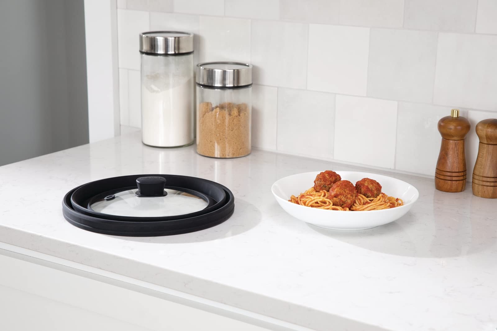 Frigidaire cover placed on a 10.5-inch plate fitting common dinnerware
