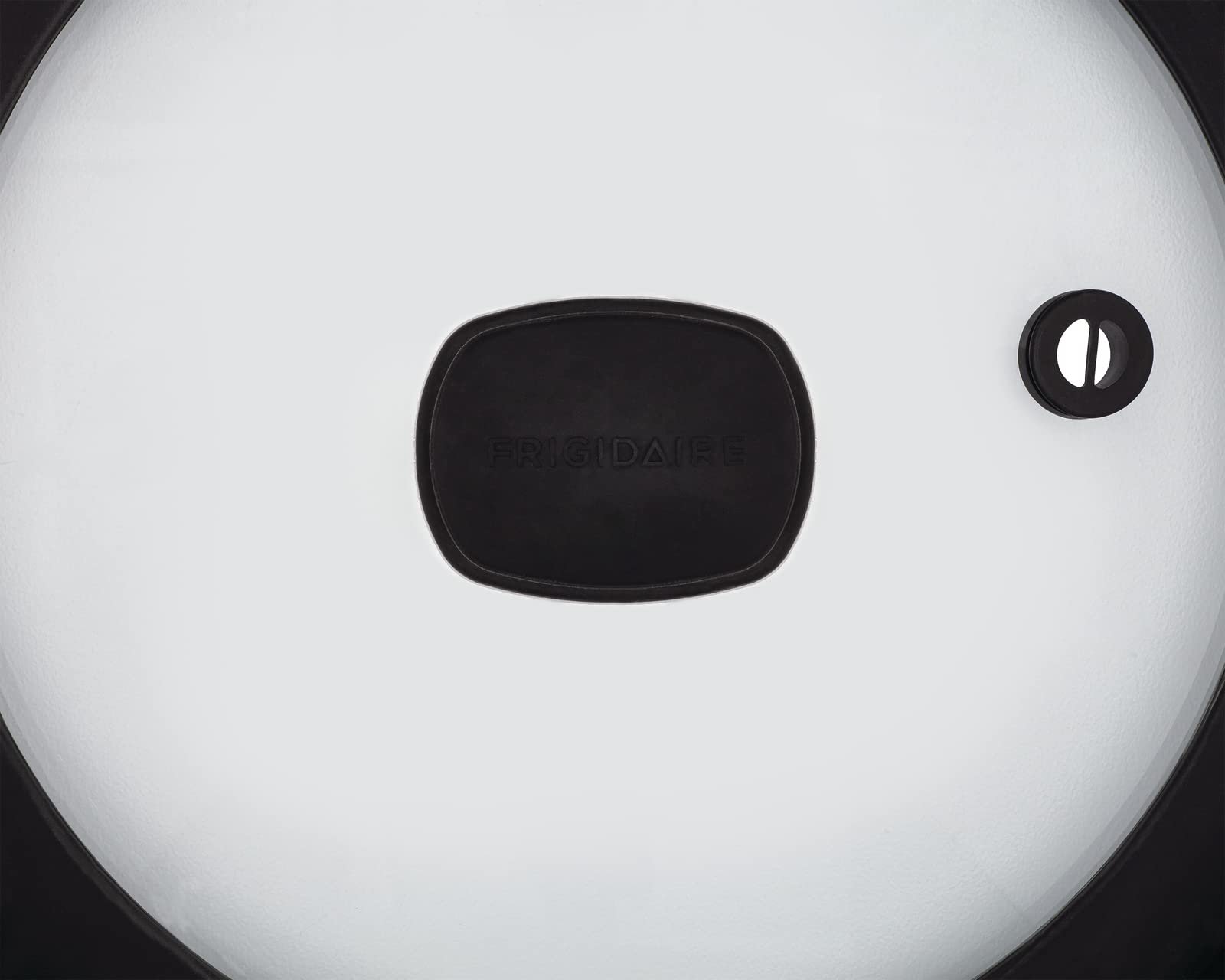 Frigidaire lid inside dishwasher demonstrating easy-clean convenience