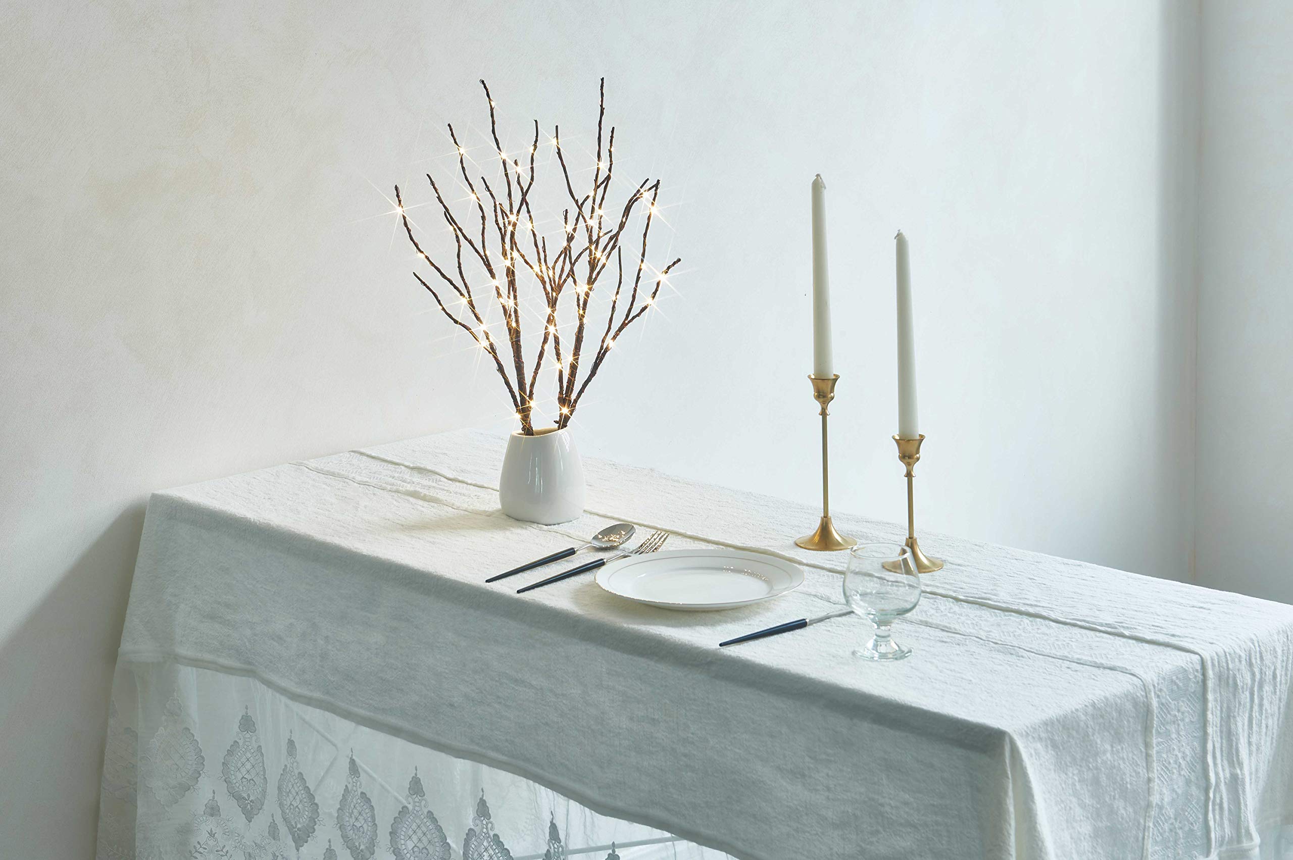 Fudios branches in holiday setting offering festive decorative flair