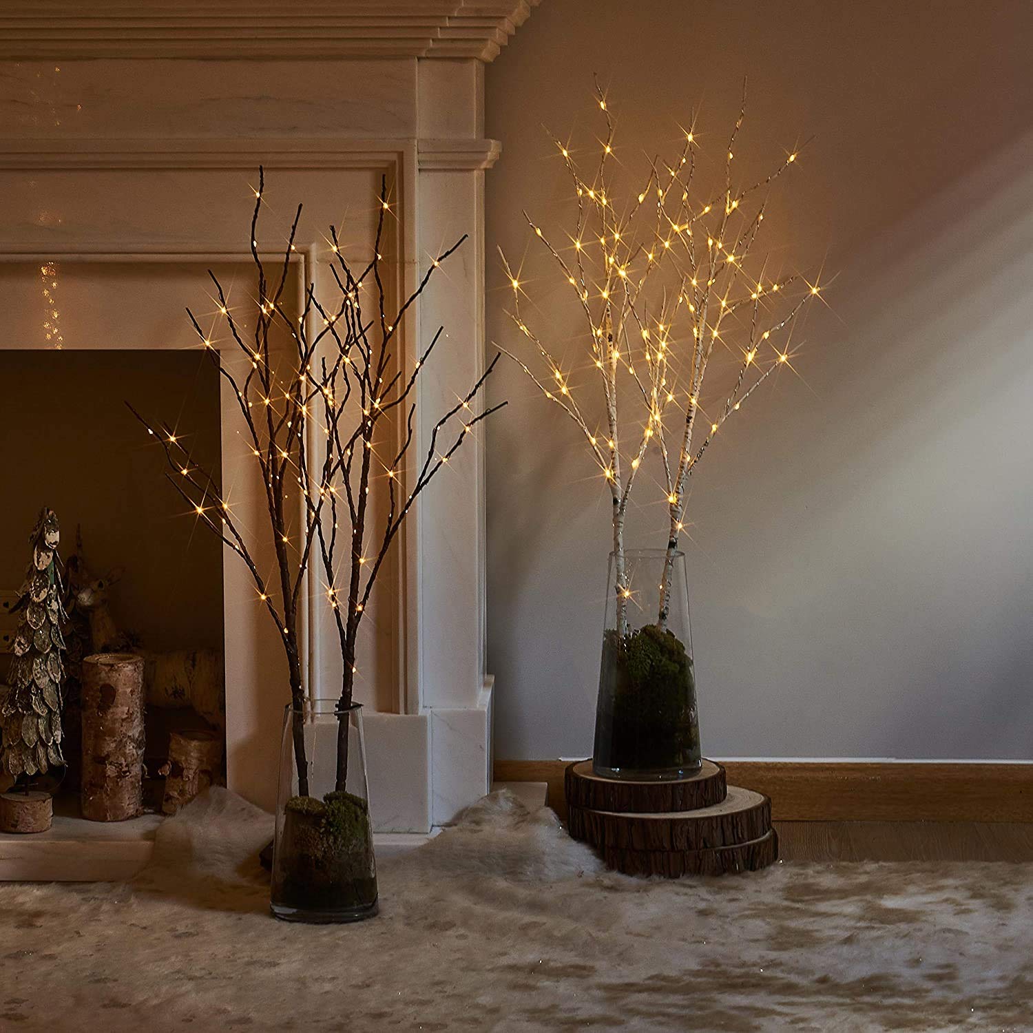 Fudios branches in vase styled centerpiece adding warm ambiance