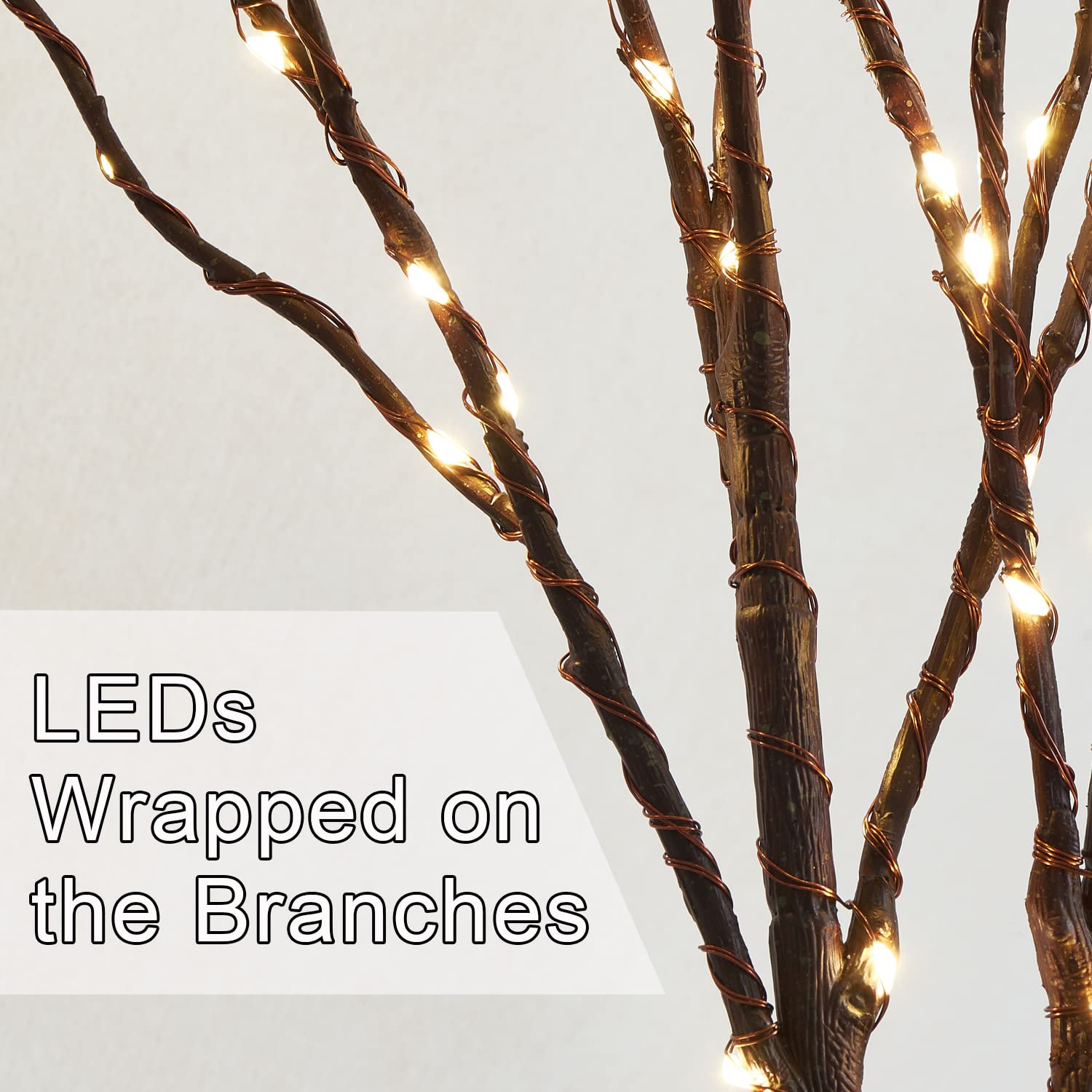 Fudios branch tip LED detail showing tiny warm-white lights and gentle glow benefit
