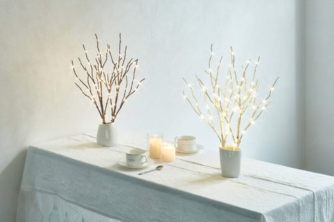 Fudios lighted branches holding ornaments for customizable styling