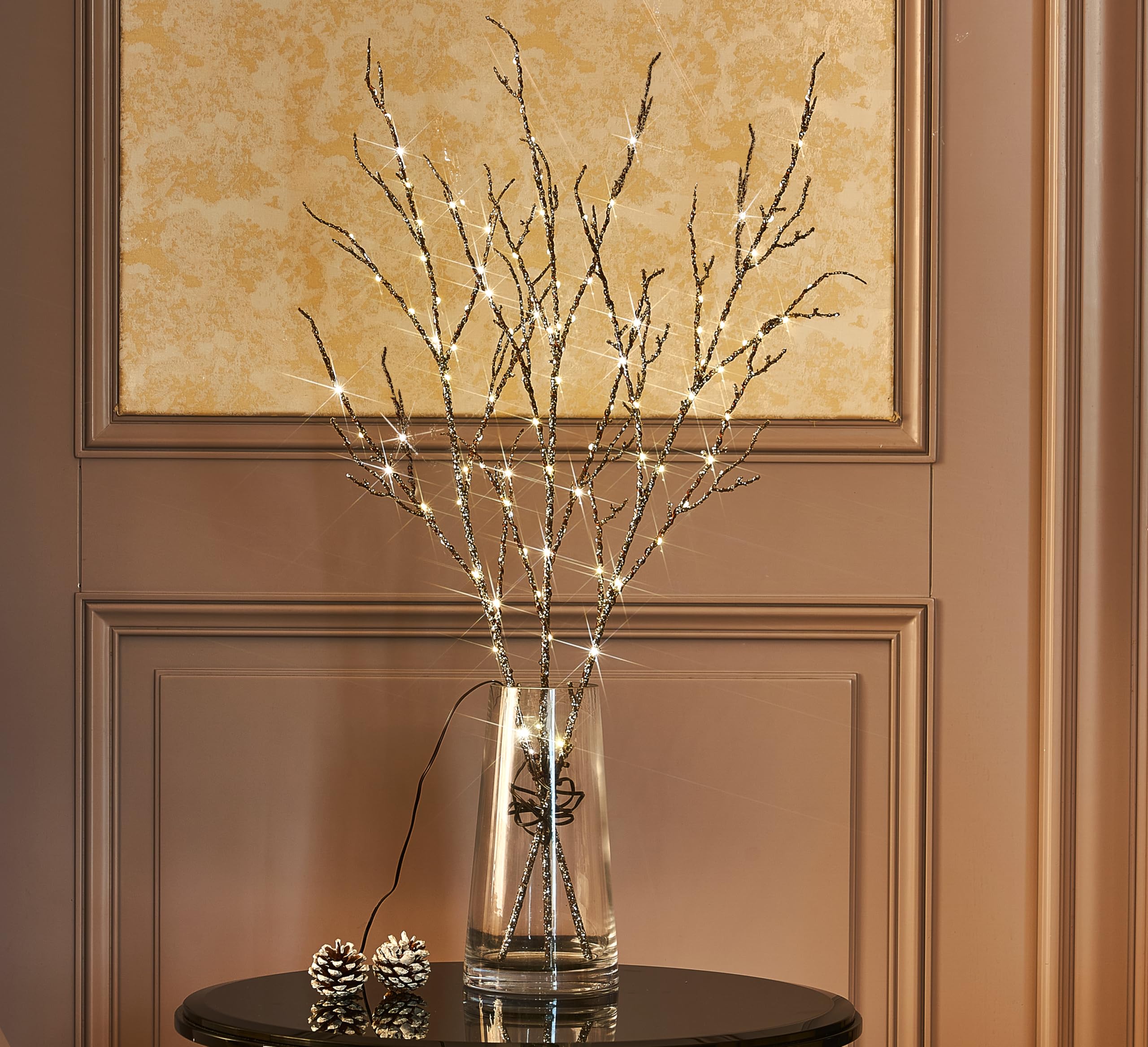 Fudios outdoor patio shelf at night with branches creating cozy ambient lighting benefit